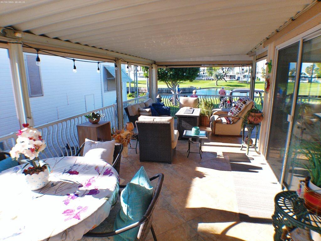 84136 Ave 44, Unit 262 Indio, CA 92203 - Photo 18 of 60 a view of a dining room with furniture window and outside view