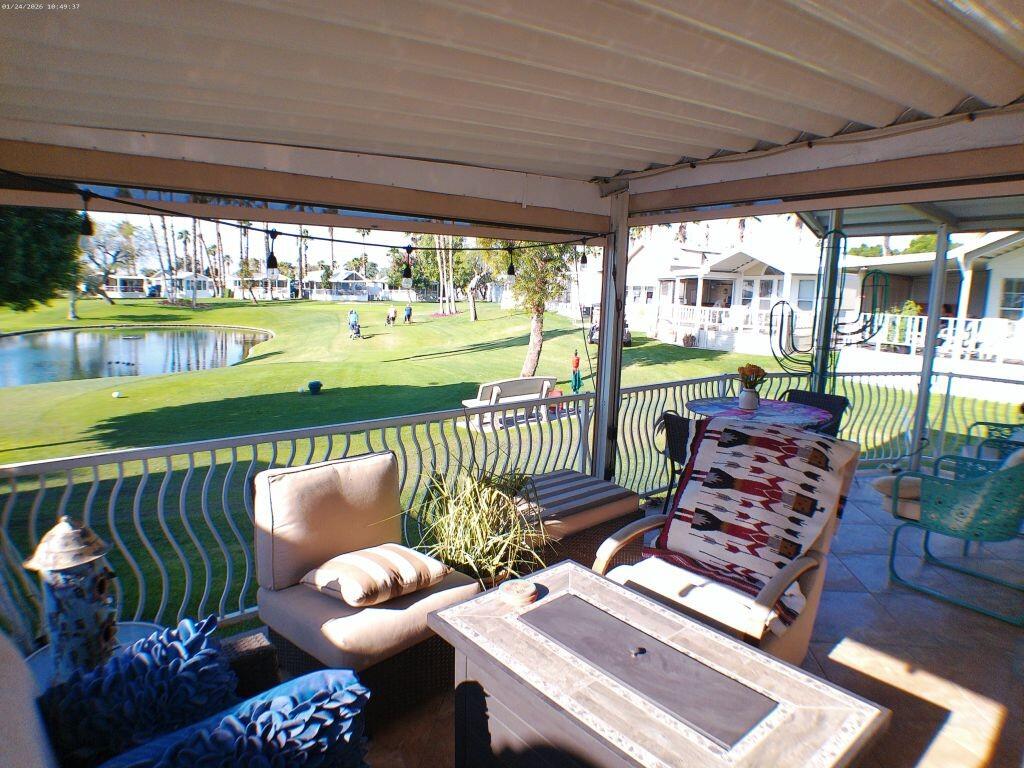 84136 Ave 44, Unit 262 Indio, CA 92203 - Photo 27 of 60 a outdoor living space with furniture and a garden