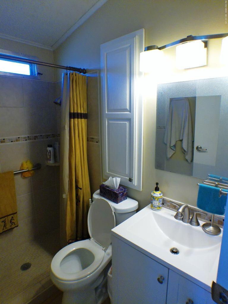 84136 Ave 44, Unit 262 Indio, CA 92203 - Photo 41 of 60 a bathroom with a sink toilet and shower