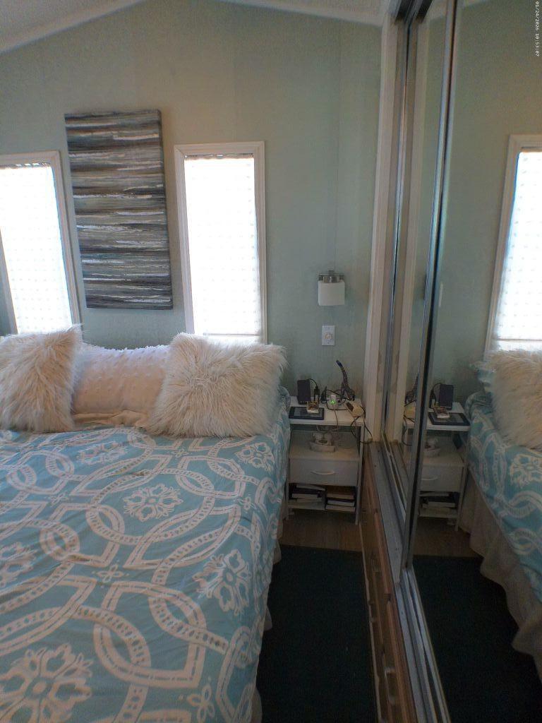 84136 Ave 44, Unit 262 Indio, CA 92203 - Photo 45 of 60 a bedroom with a bed and a window