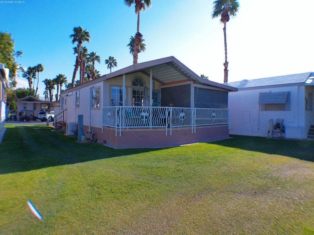 84136 Ave 44, Unit 262 Indio, CA 92203 - Photo 60 of 60 a front view of a house with garden