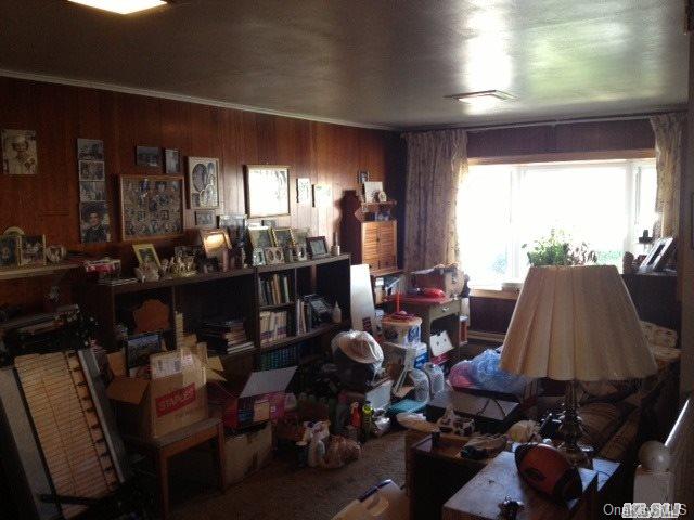 135-47 124th Street Queens, NY 11420 - Photo 11 of 17 a living room with lots of furniture and a large window