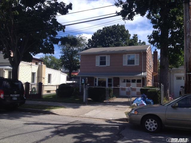 135-47 124th Street Queens, NY 11420 - Photo 2 of 17 a car parked on the side of a street