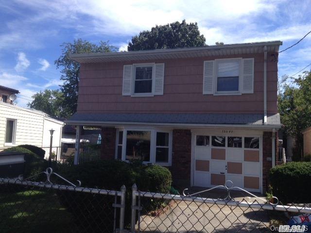 135-47 124th Street Queens, NY 11420 - Photo 3 of 17 a view of house with yard