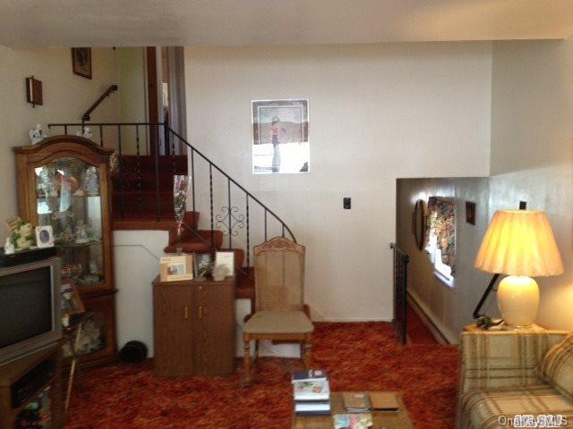 135-47 124th Street Queens, NY 11420 - Photo 6 of 17 a view of entryway and hall with wooden floor