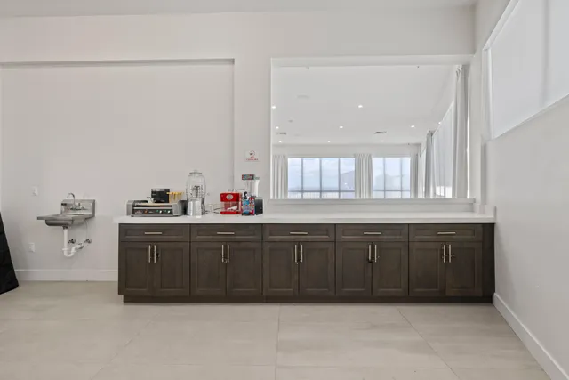 a view of a room with a window and a balcony