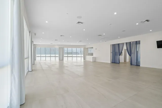 a view of living room with stainless steel appliances