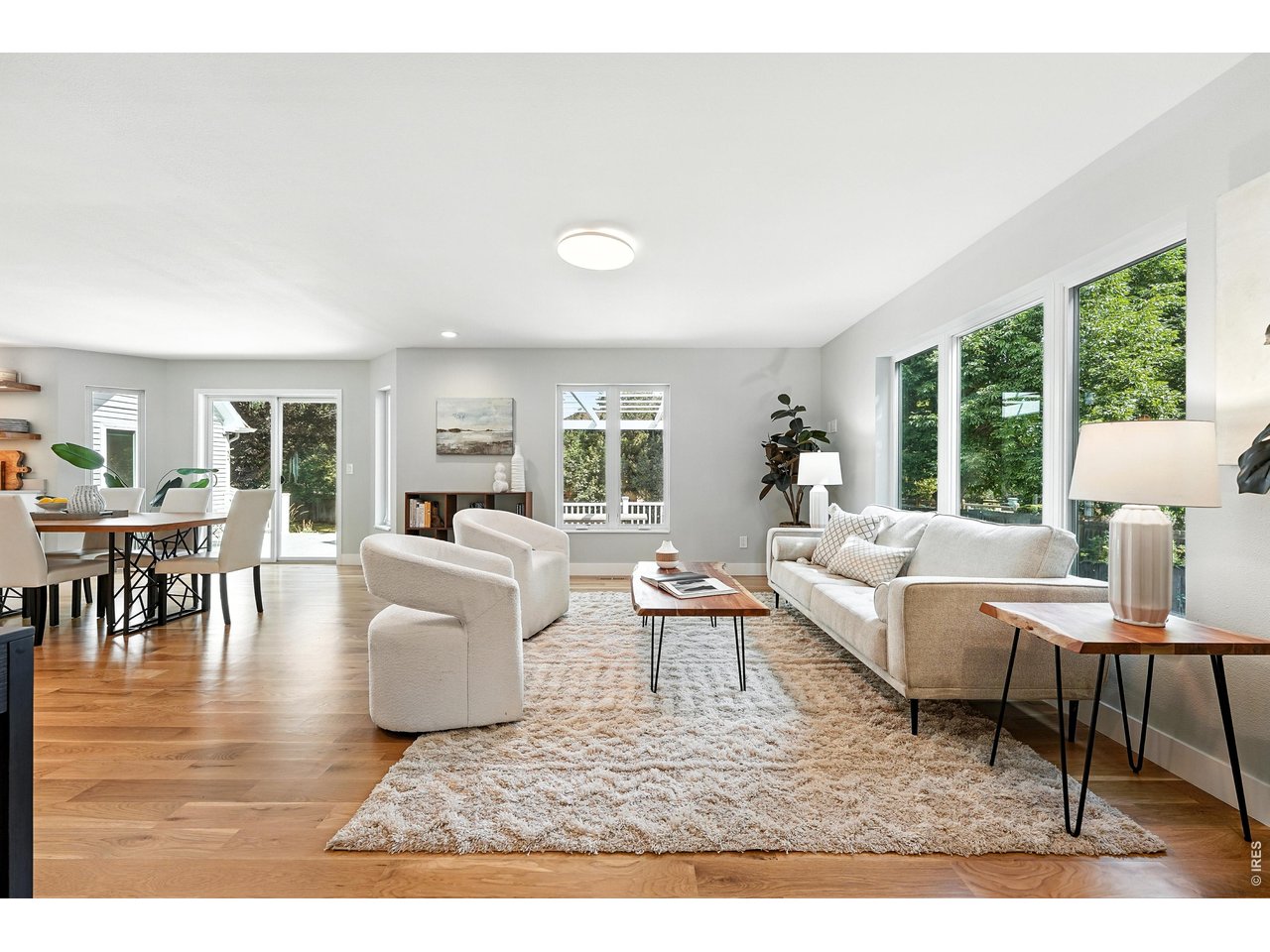 4557 Apple Way Boulder, CO 80301 - Photo 5 of 42 Sunlight pours through oversized windows, filling the home with warmth from the moment you walk inside.