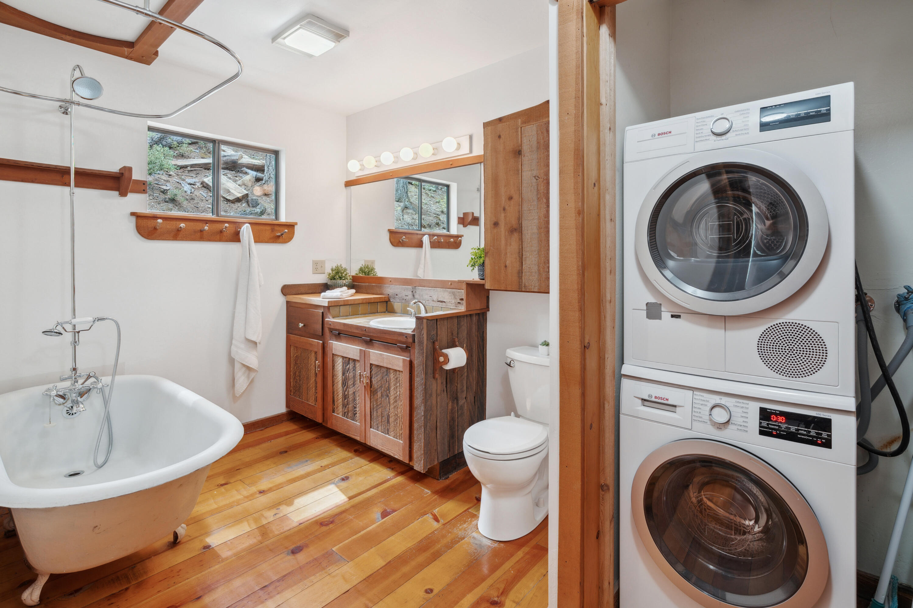 2120 Pack Trail Mount Shasta, CA 96067 - Photo 26 of 92 a spacious bathroom with a washing machine and a sink