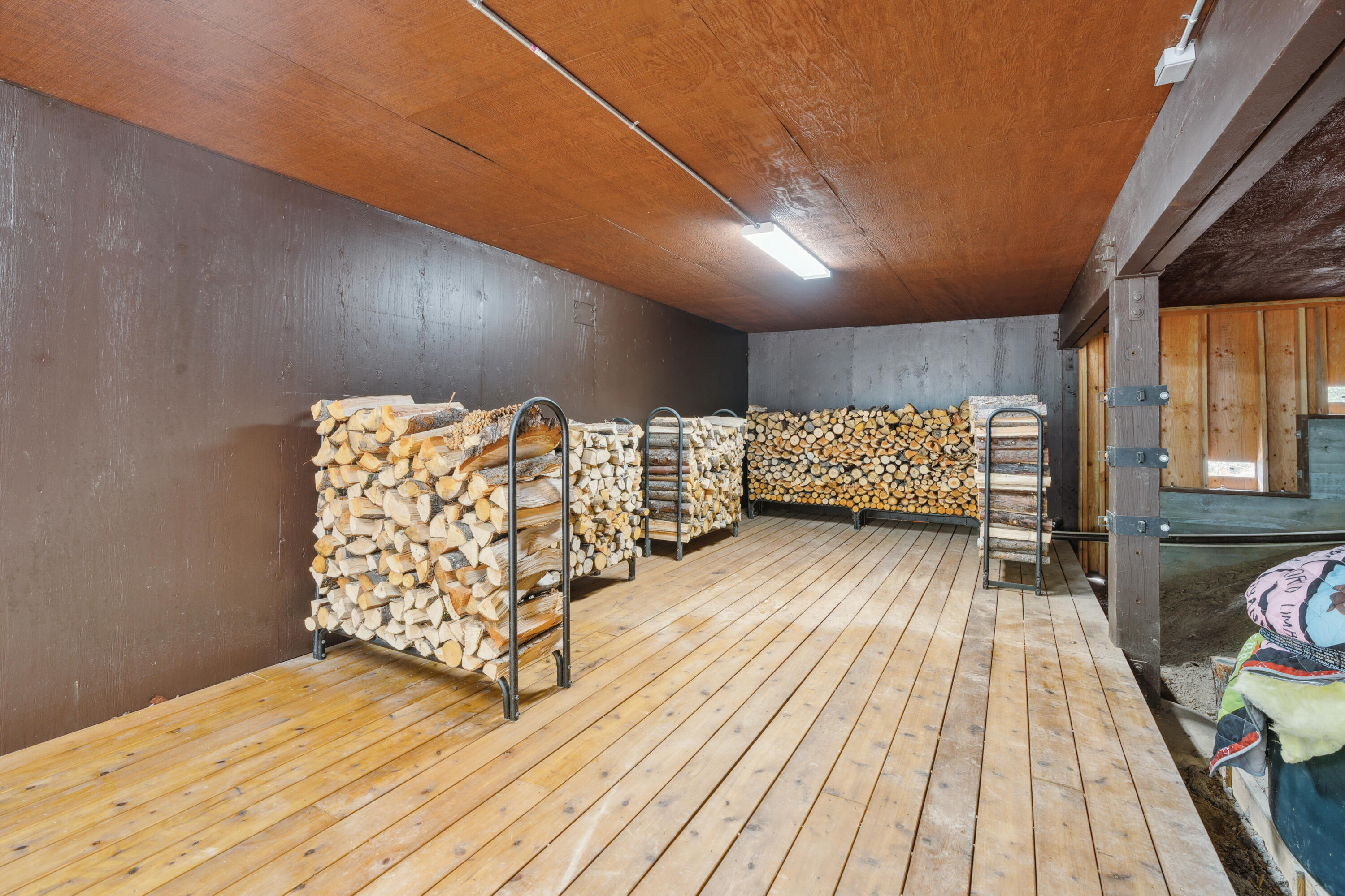 2120 Pack Trail Mount Shasta, CA 96067 - Photo 36 of 92 a spacious bedroom with a bed and wooden floor