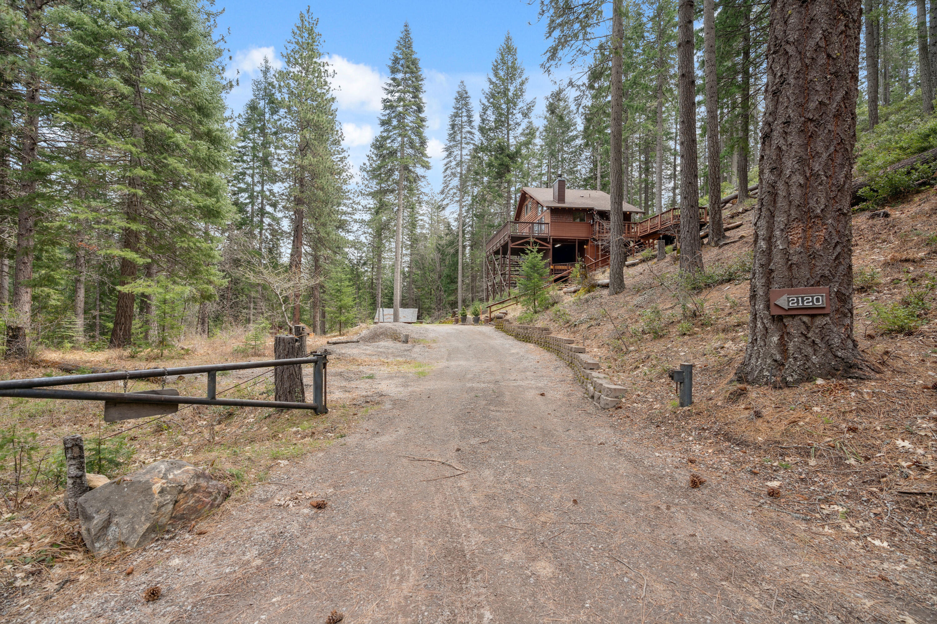2120 Pack Trail Mount Shasta, CA 96067 - Photo 43 of 92 a backyard of a house with table and chairs