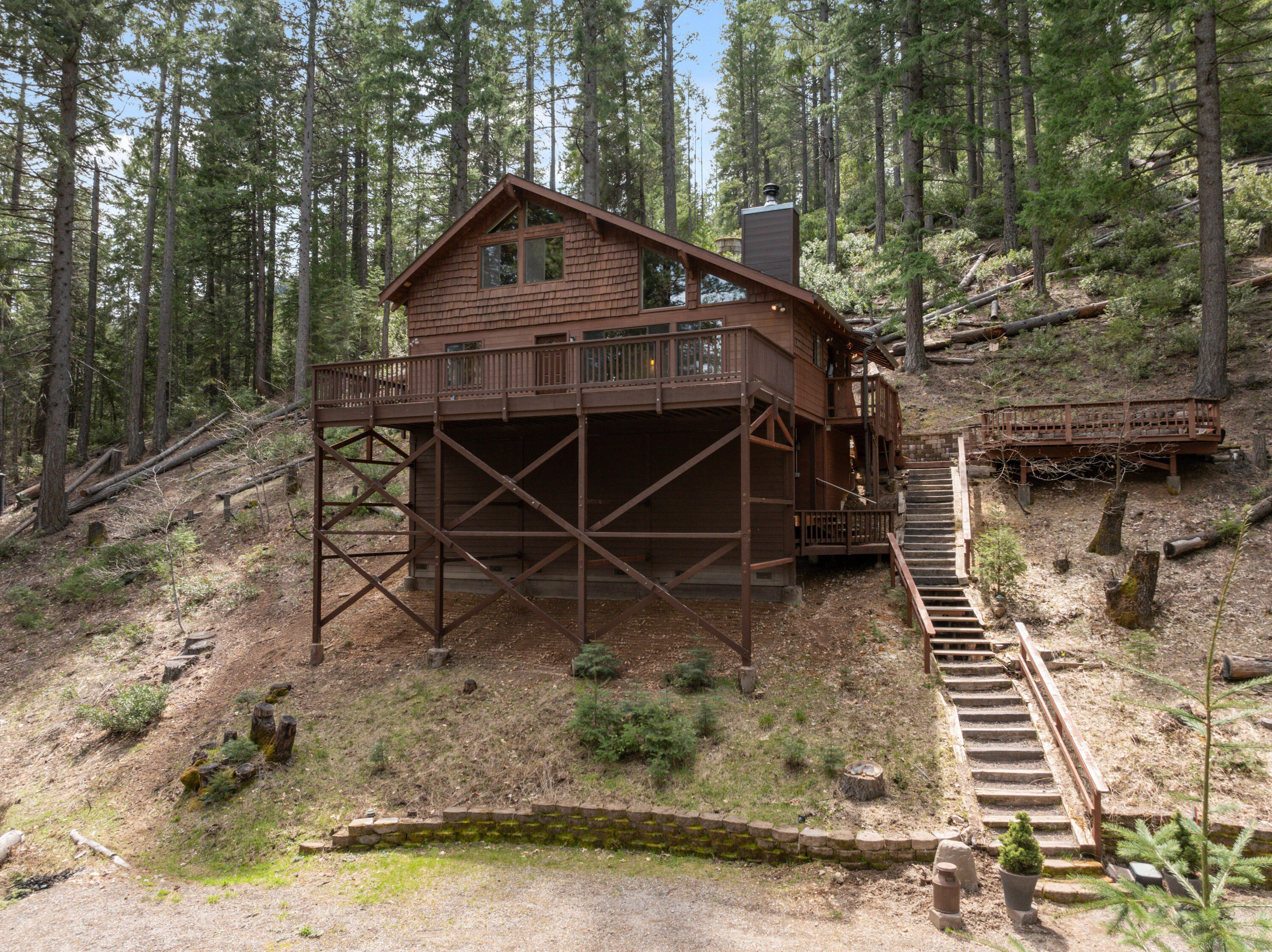 2120 Pack Trail Mount Shasta, CA 96067 - Photo 53 of 92 a view of a wooden house with a yard