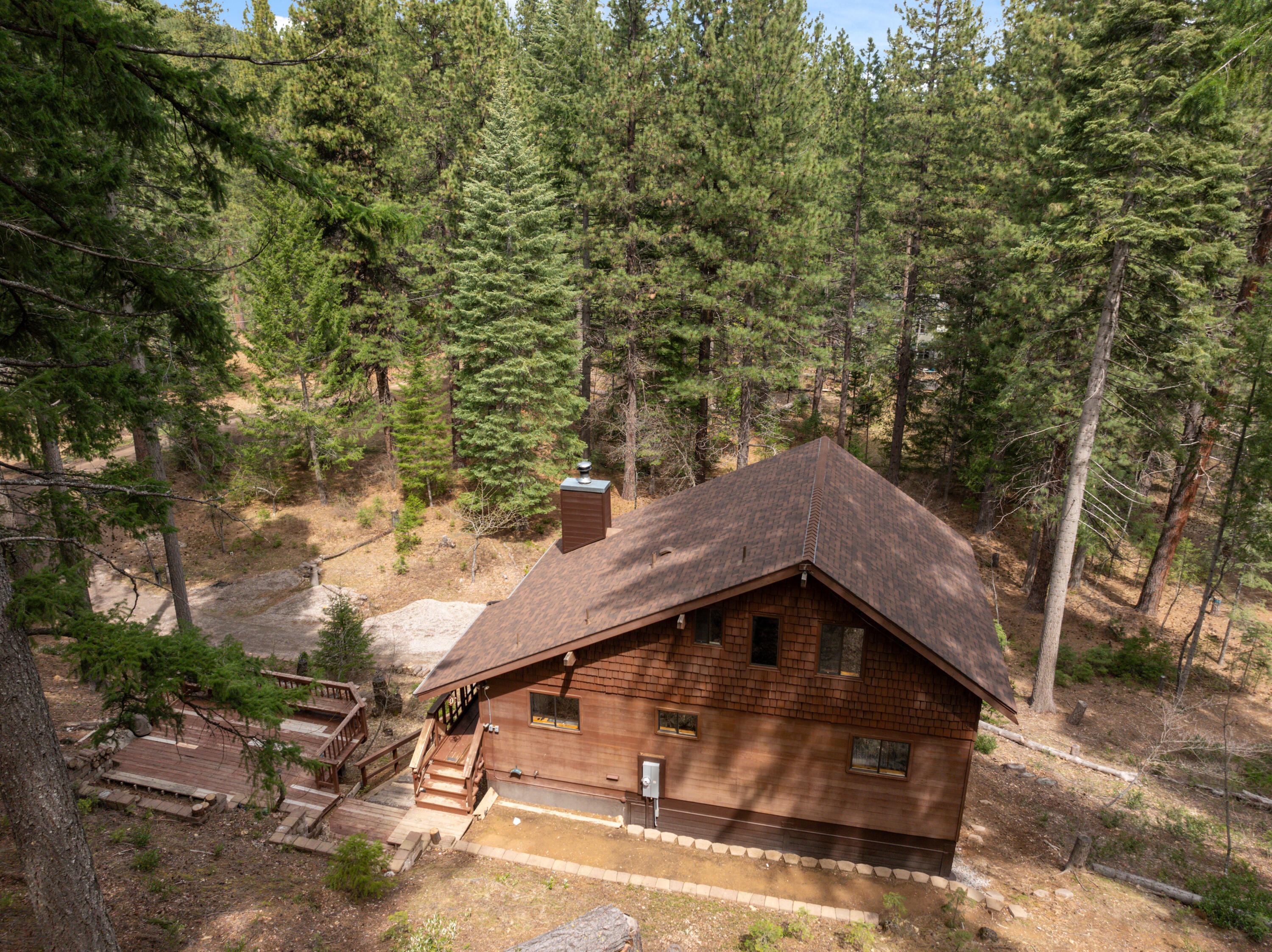 2120 Pack Trail Mount Shasta, CA 96067 - Photo 57 of 92 a house with trees in front of it