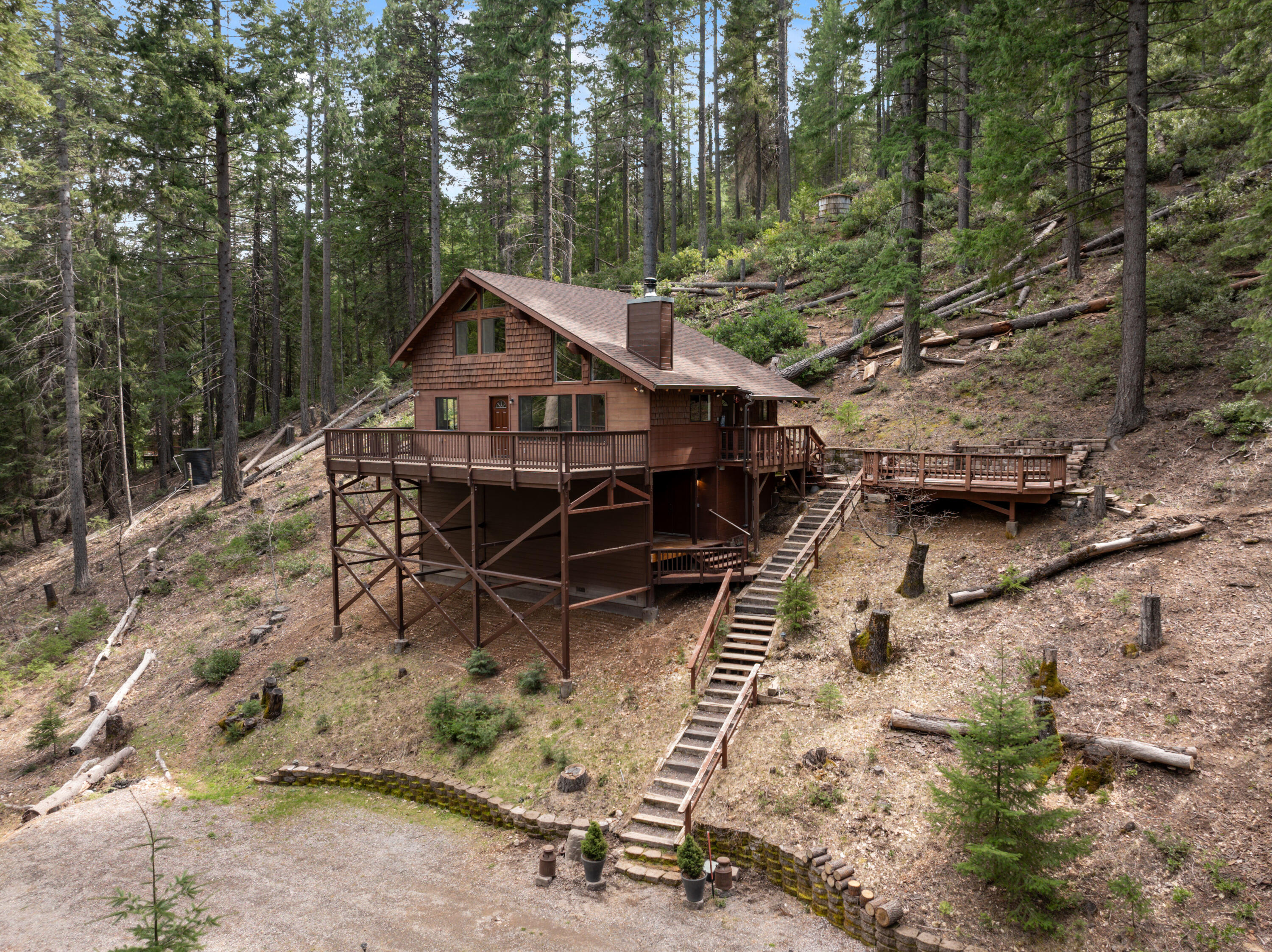 2120 Pack Trail Mount Shasta, CA 96067 - Photo 62 of 92 an aerial view of a house with a yard and wooden fence