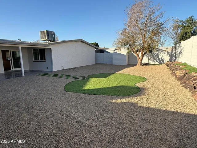 a view of backyard of house