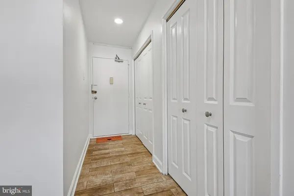 a view of a bathroom from the hallway