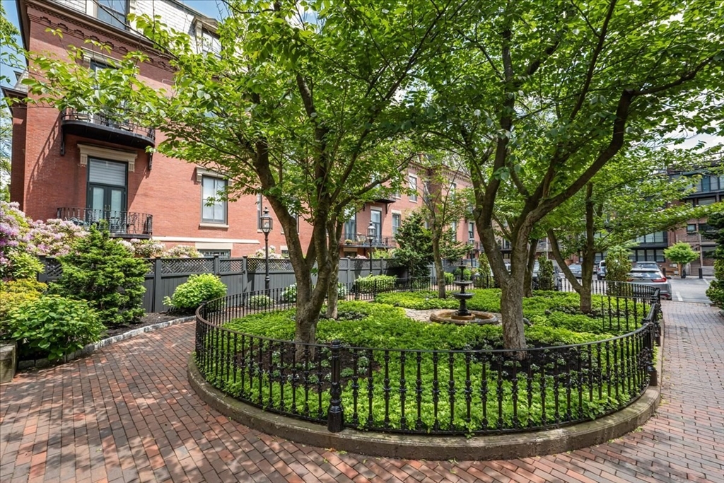 130 Appleton Street, Unit 4E Boston, MA 02116 - Photo 15 of 17 a front view of a house with garden