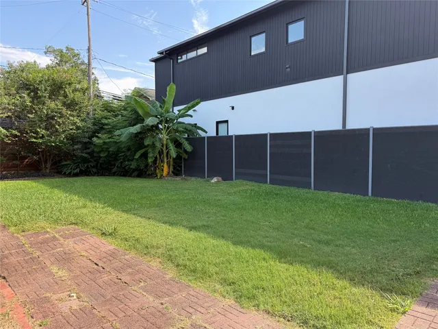 a house view with a garden space