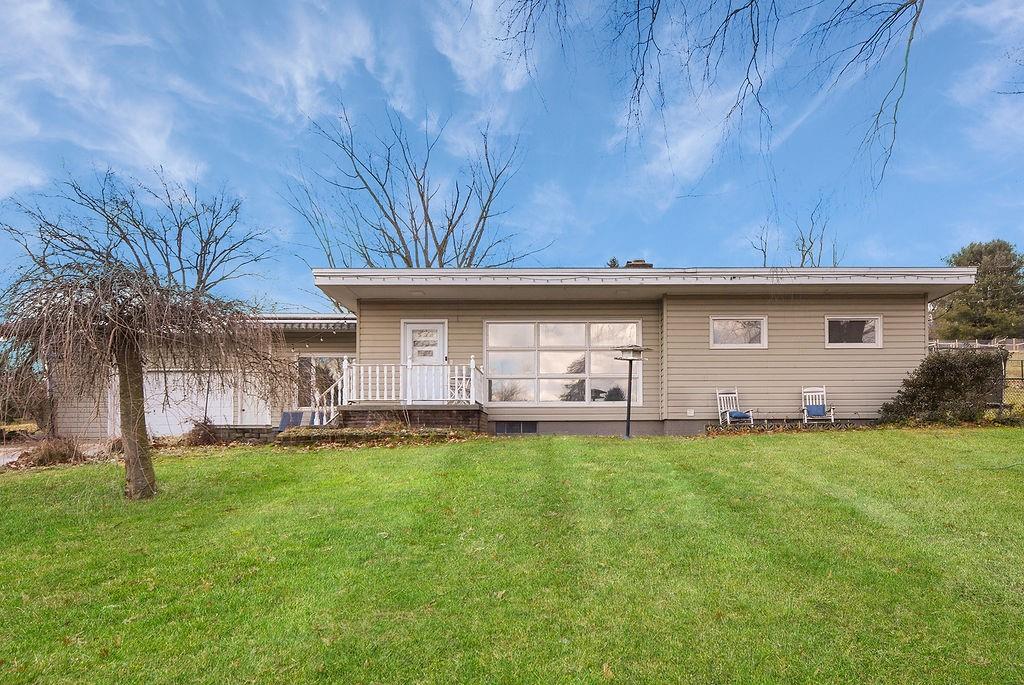 139 Camp Run Road Harmony, PA 16037 - Photo 1 of 41 a view of a house with a backyard