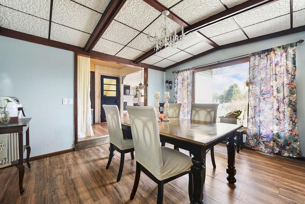 139 Camp Run Road Harmony, PA 16037 - Photo 11 of 41 a view of a dining room with furniture window and wooden floor