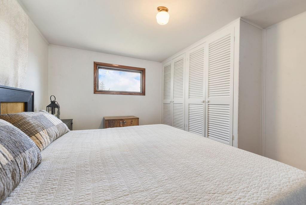 139 Camp Run Road Harmony, PA 16037 - Photo 22 of 41 a bedroom with a large bed and a window