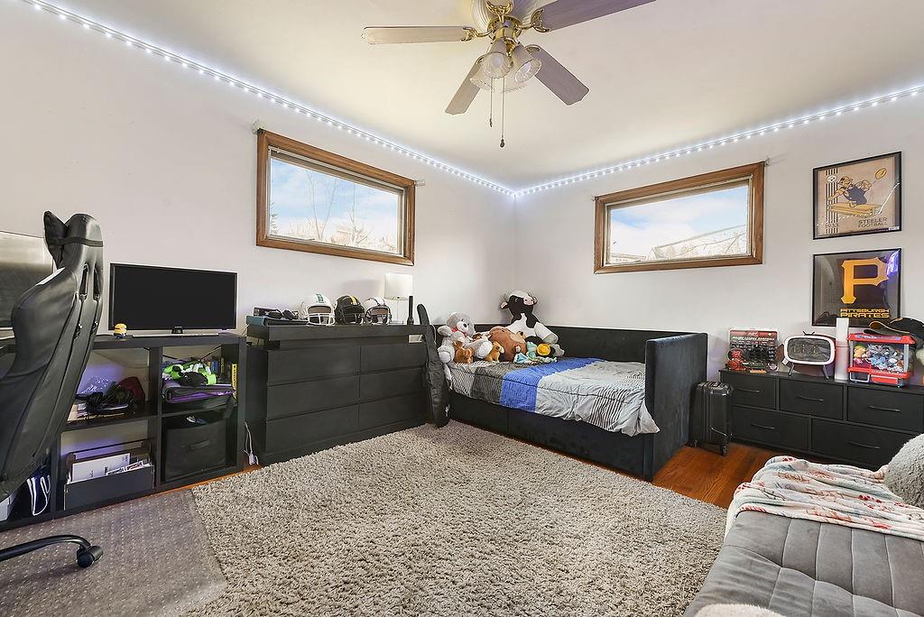 139 Camp Run Road Harmony, PA 16037 - Photo 24 of 41 a bedroom with furniture and a flat screen tv