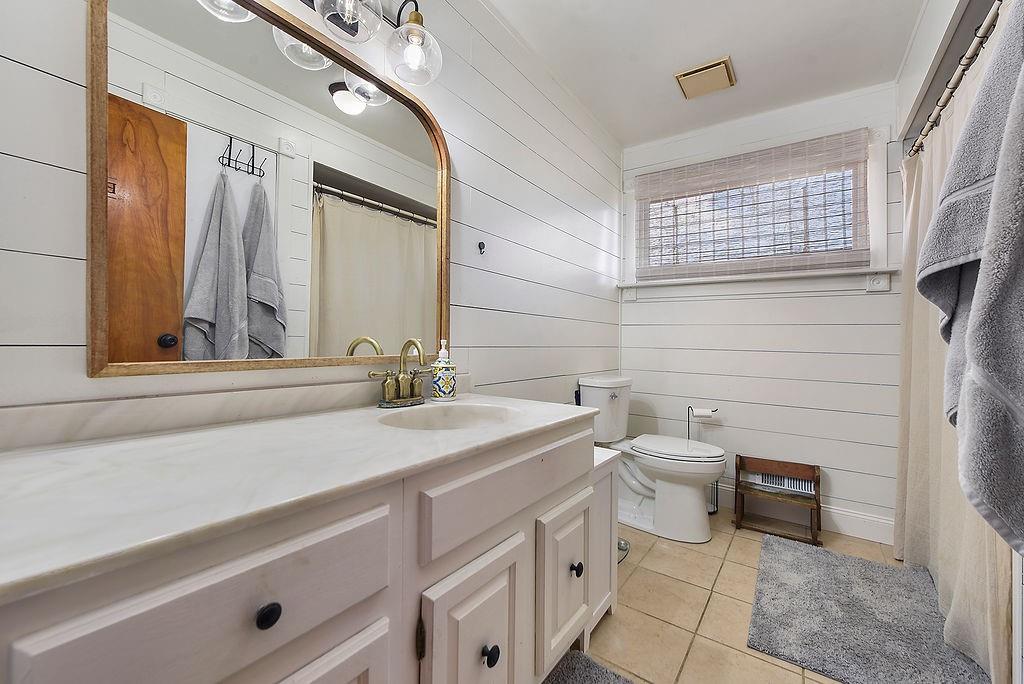 139 Camp Run Road Harmony, PA 16037 - Photo 25 of 41 a bathroom with a sink a toilet and mirror