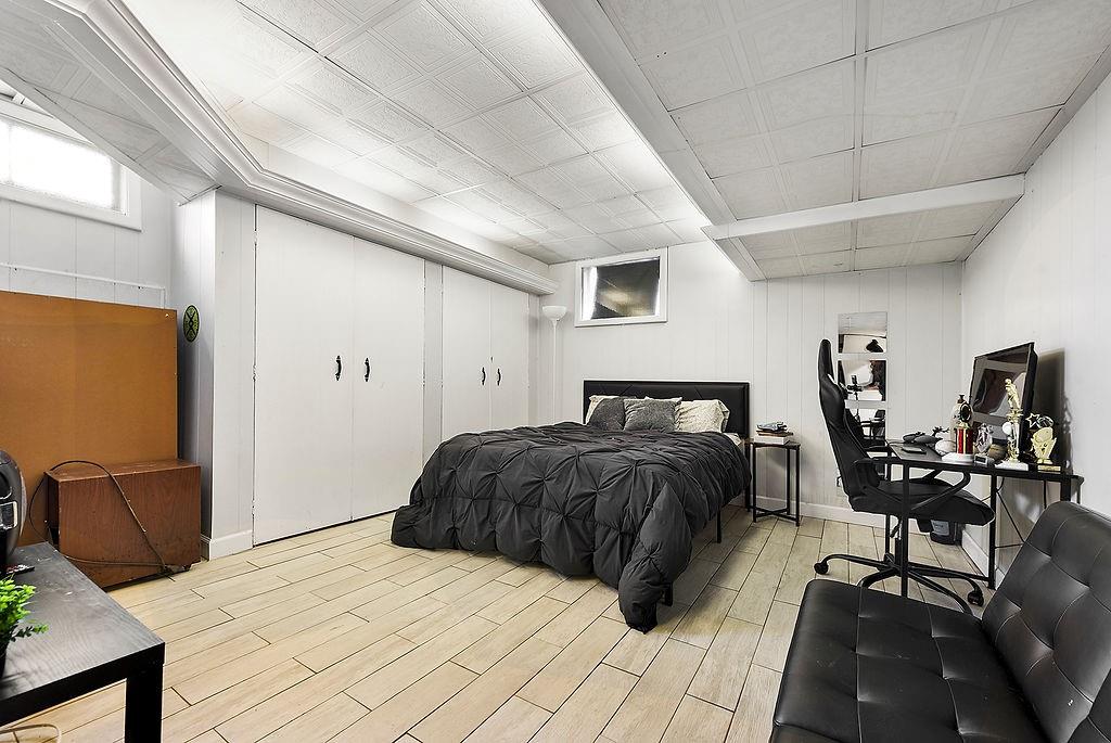 139 Camp Run Road Harmony, PA 16037 - Photo 26 of 41 a bedroom with furniture and wooden floor