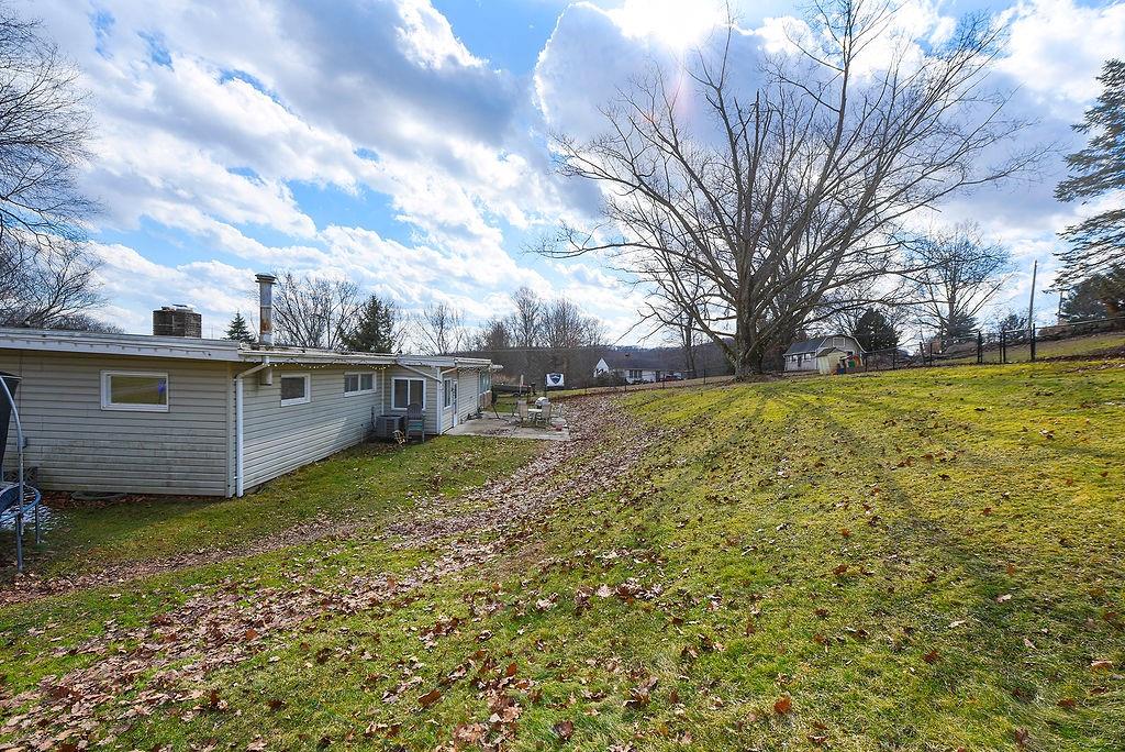 139 Camp Run Road Harmony, PA 16037 - Photo 41 of 41 a view of a backyard with large trees