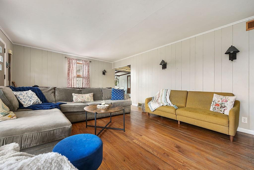 139 Camp Run Road Harmony, PA 16037 - Photo 7 of 41 a living room with furniture a rug and a window