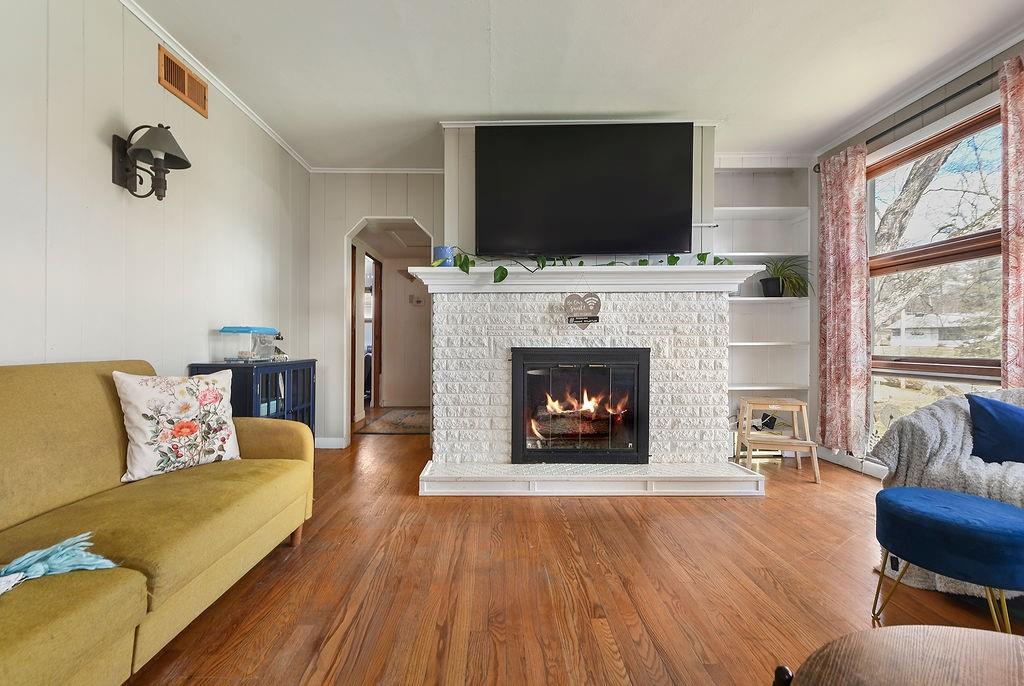 139 Camp Run Road Harmony, PA 16037 - Photo 9 of 41 a living room with furniture and a fireplace or television