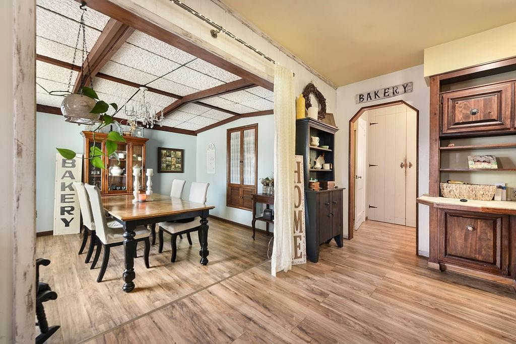 139 Camp Run Road Harmony, PA 16037 - Photo 10 of 41 a view of a dining room with furniture and wooden floor