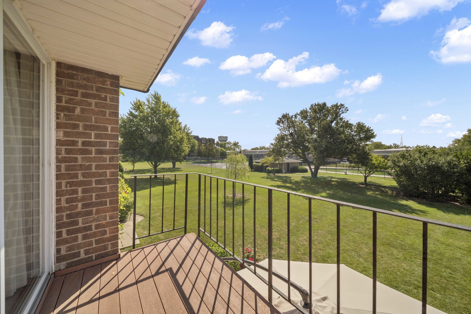 10381 Dearlove Road, Unit 2A Glenview, IL 60025 - Photo 16 of 19 a view of a balcony with an outdoor space