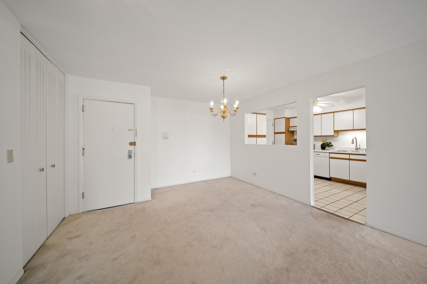 10381 Dearlove Road, Unit 2A Glenview, IL 60025 - Photo 2 of 19 a view of a kitchen with refrigerator and windows