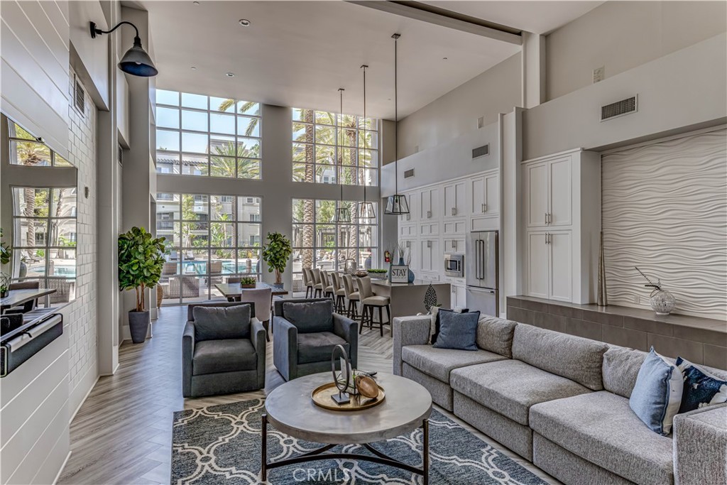 2366 Scholarship Irvine, CA 92612 - Photo 25 of 27 a living room with furniture and a large window