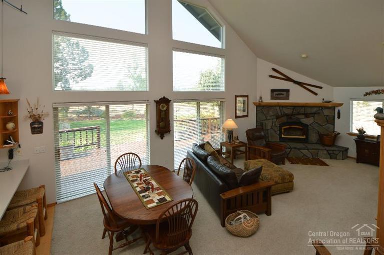 70295 Club Road Sisters, OR 97759 - Photo 10 of 25 Great room with deck access and lots of