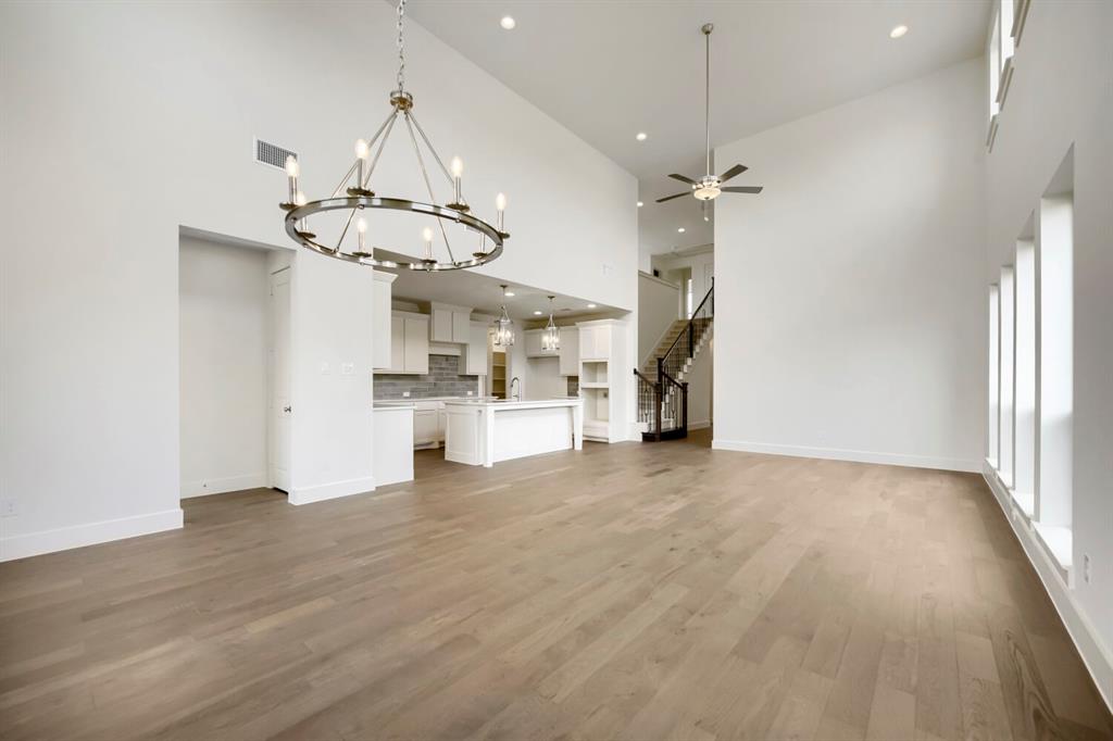 11548 Wulstone Road Haslet, TX 76052 - Photo 5 of 26 Soaring ceilings featuring a contemporary chandelier and recessed lighting