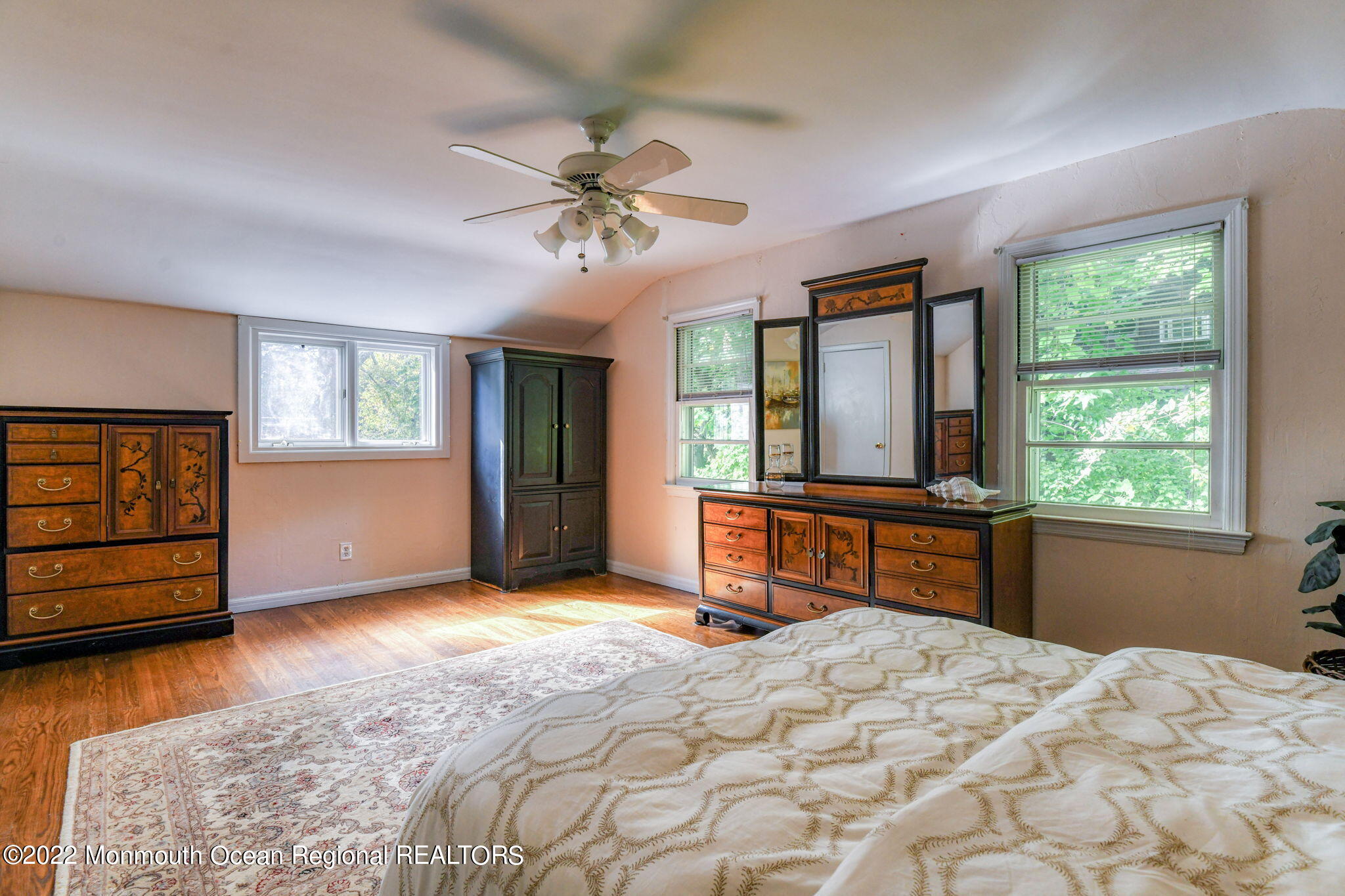309 Bendermere Avenue Interlaken, NJ 07712 - Photo 24 of 37 a bedroom with a bed and a window