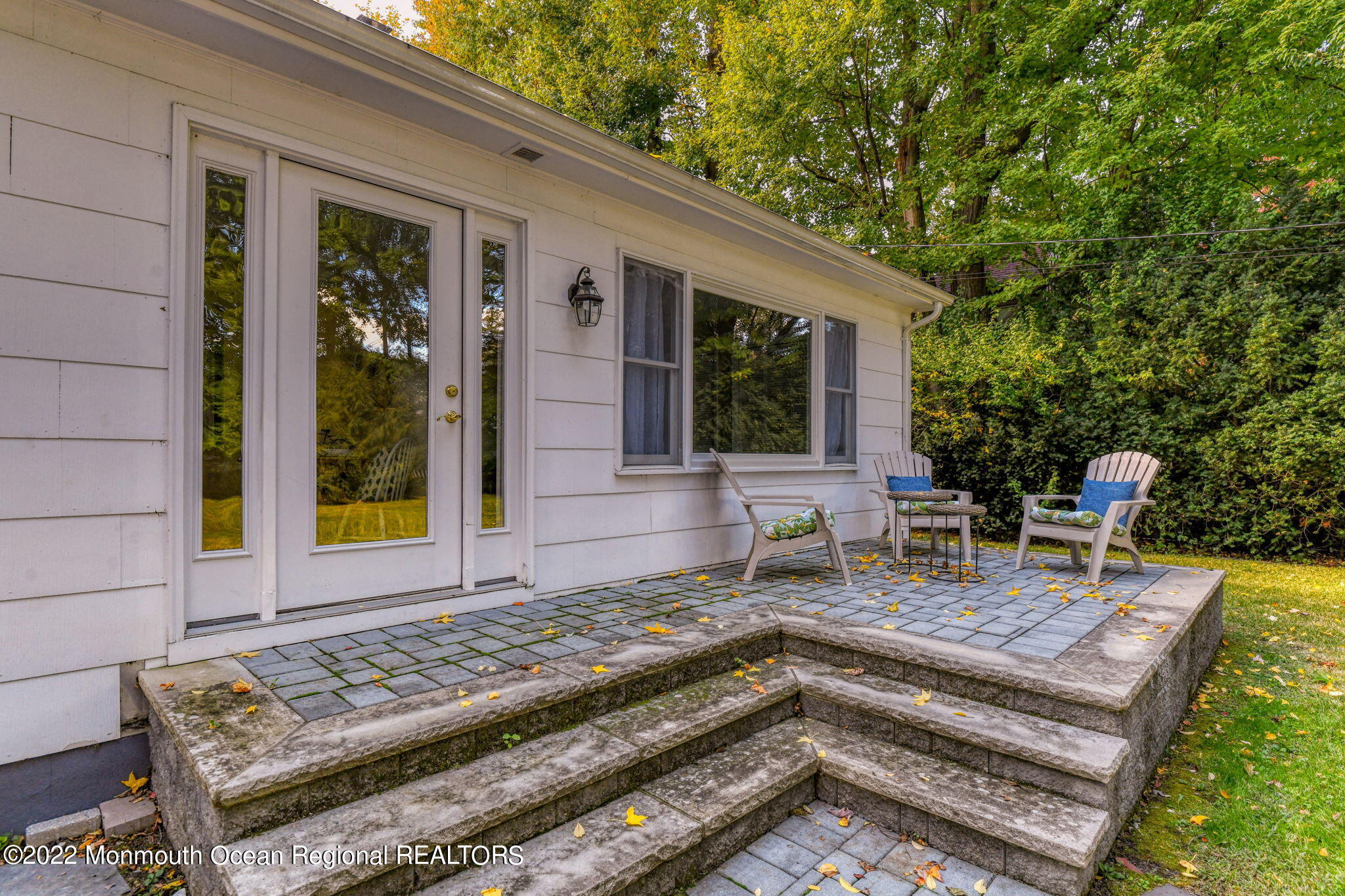 309 Bendermere Avenue Interlaken, NJ 07712 - Photo 30 of 37 a backyard of a house with seating space