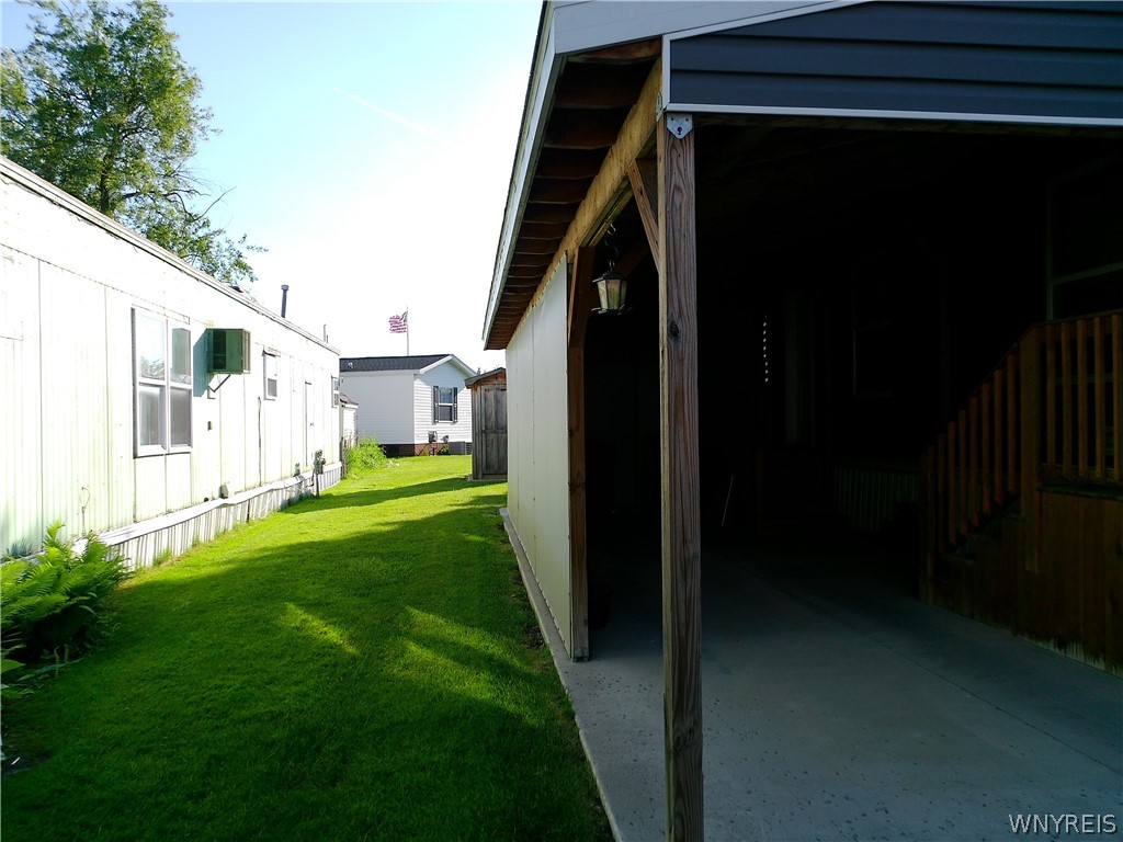 29 Xavier Road Clarence, NY 14031 - Photo 3 of 18 carport & side yard