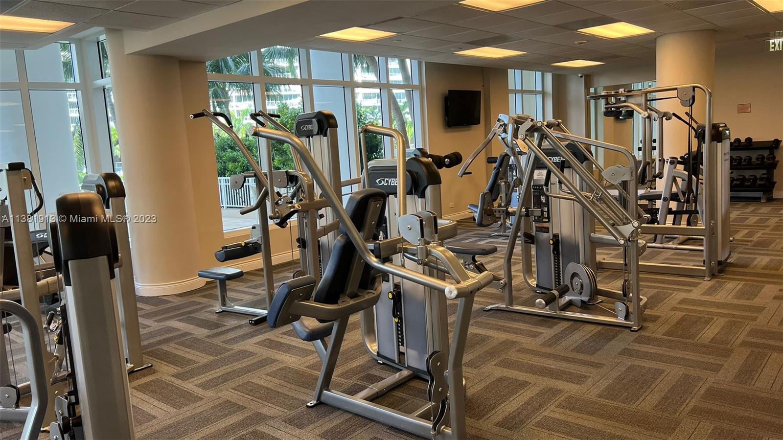 801 Brickell Key Boulevard, Unit 908 Miami, FL 33131 - Photo 25 of 29 a view of a room with gym equipment