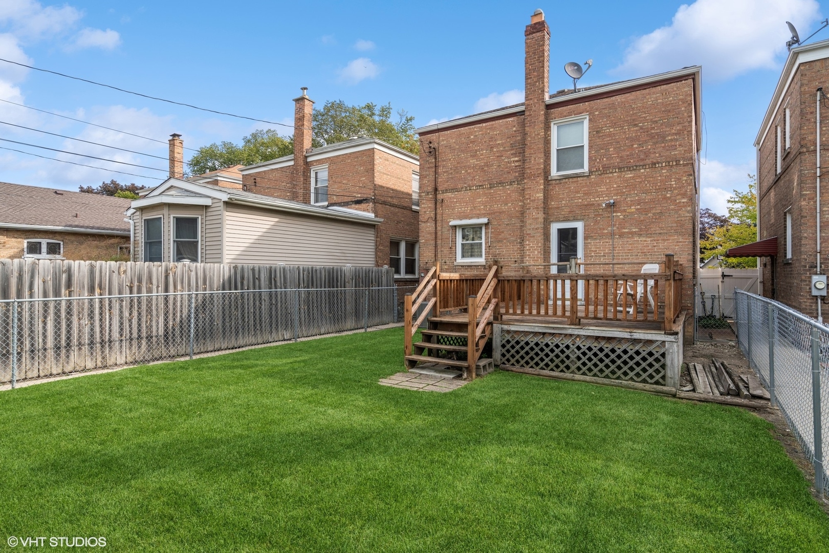 1437 Elgin Avenue Forest Park, IL 60130 - Photo 11 of 13 a view of a chair and table in backyard of the house