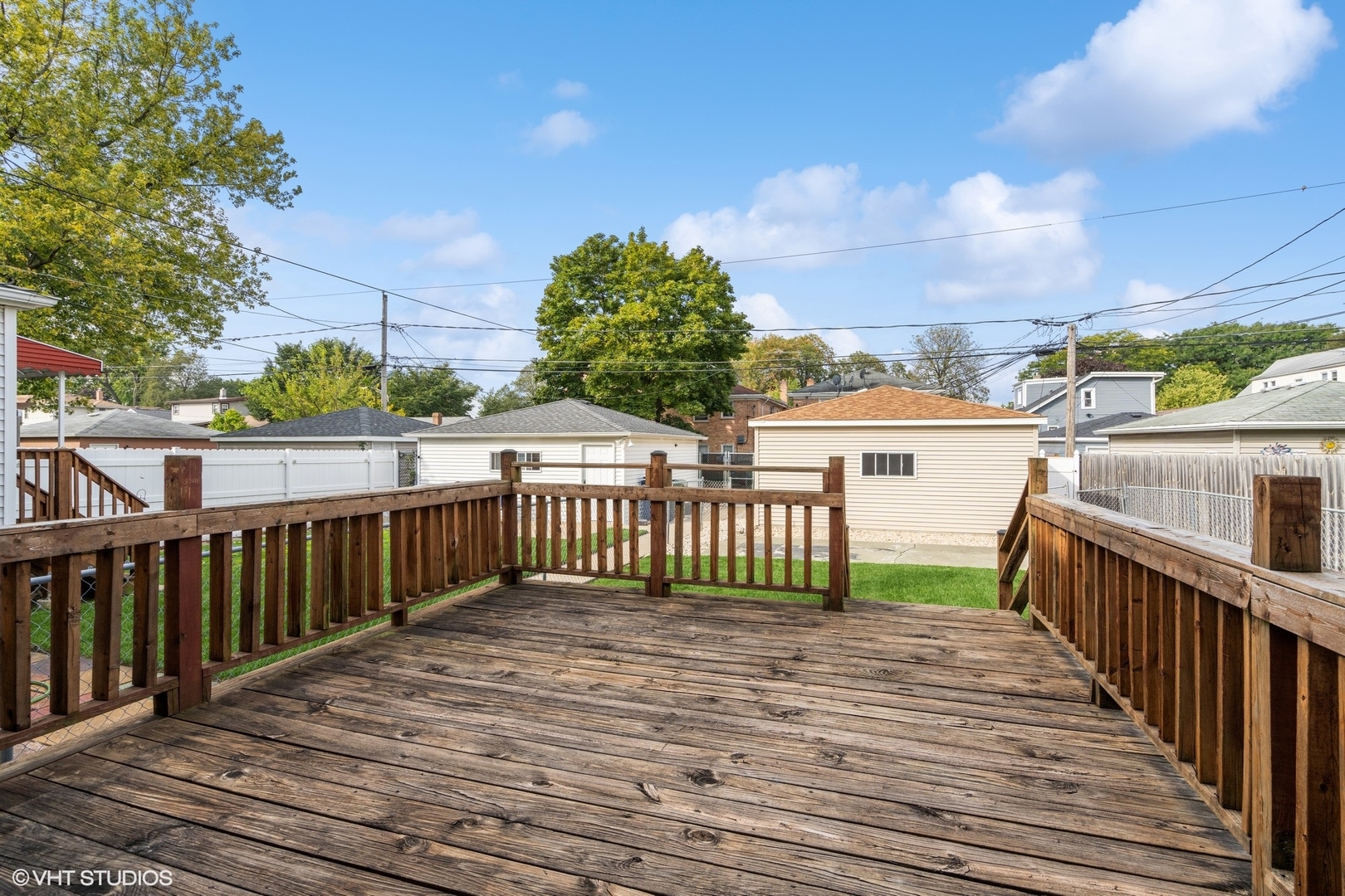 1437 Elgin Avenue Forest Park, IL 60130 - Photo 12 of 13 a view of a deck with wooden floor and fence