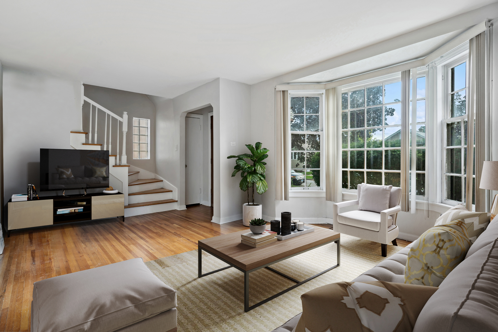 1437 Elgin Avenue Forest Park, IL 60130 - Photo 4 of 13 a living room with furniture and a flat screen tv