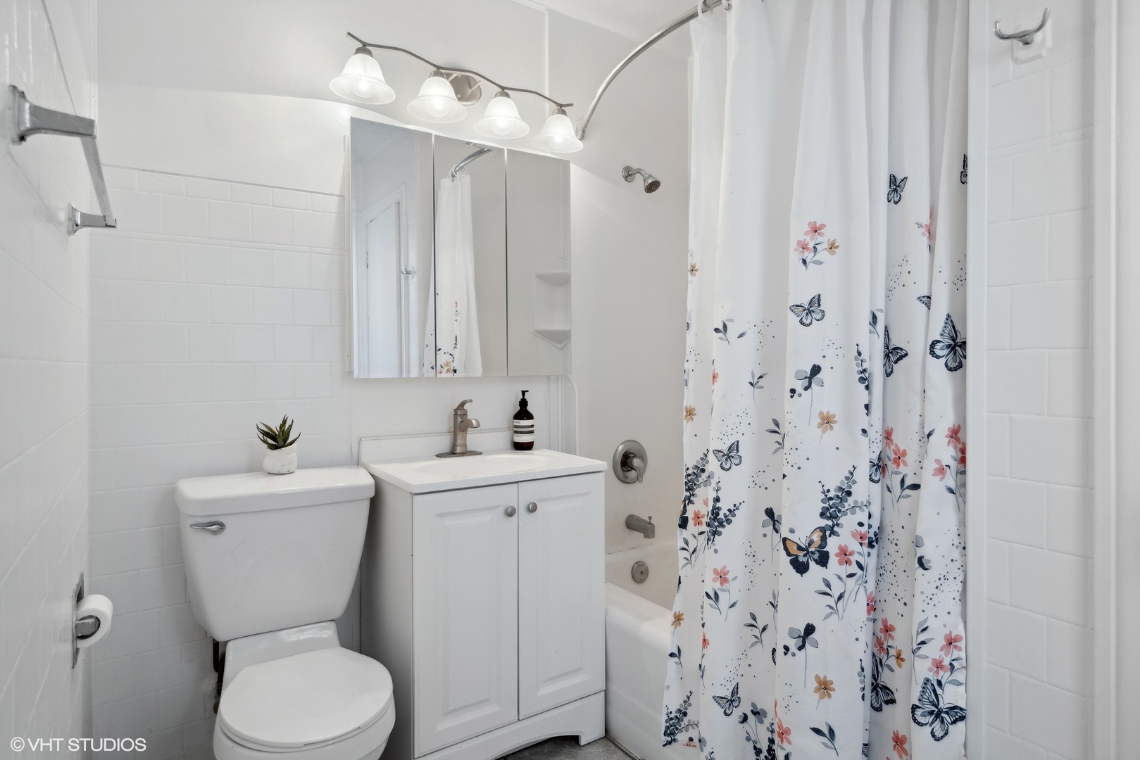 1437 Elgin Avenue Forest Park, IL 60130 - Photo 8 of 13 a bathroom with a toilet sink and mirror