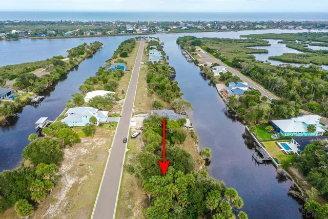 an aerial view of lake residential house with swimming pool and outdoor space