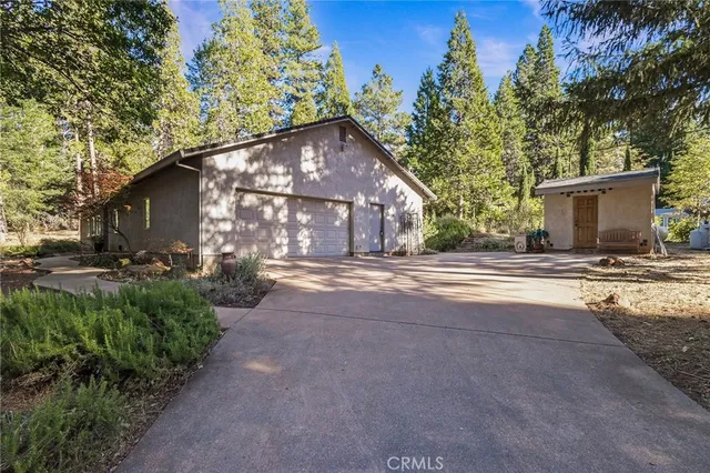 a backyard of a house with lots of green space