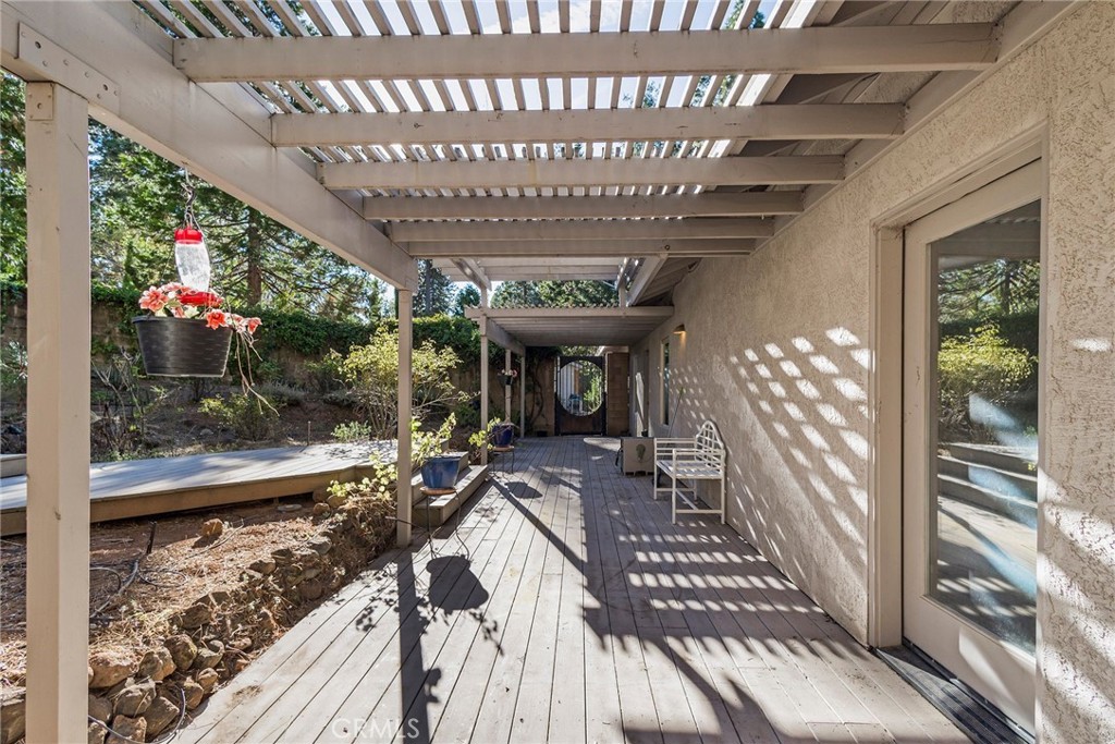 4911 Contentment Lane Forest Ranch, CA 95942 - Photo 8 of 30 a view of a living room and chandelier in a balcony