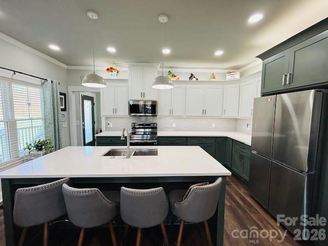 278 Right Prong Road Ellenboro, NC 28040 - Photo 4 of 47 a kitchen with a dining table chairs refrigerator and cabinets