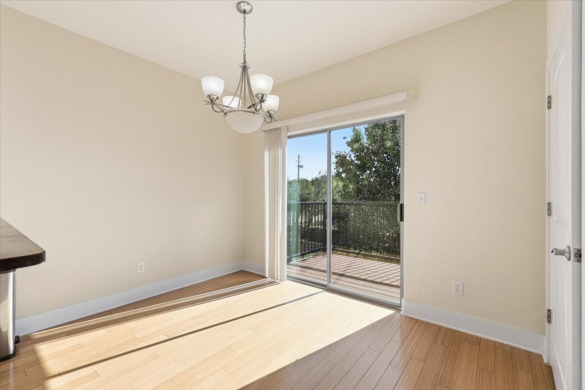 13420 Lyndhurst Street, Unit 807 Austin, TX 78729 - Photo 11 of 29 a view of an empty room with a window